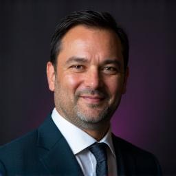 Headshot of Alex Pounamu, CEO